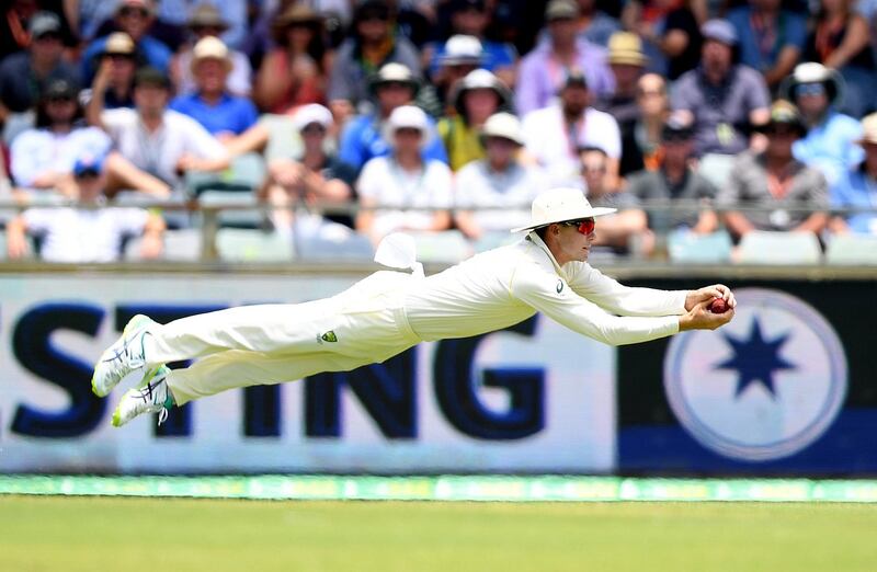 epaselect epa06390565 Australian 12th man Peter Handscomb takes a catch to dismiss England batsman Dawid Malan from the bowling of Nathan Lyon for 140 runs on Day 2 of the Third Ashes Test match between Australia and England at the WACA ground in Perth, Australia, 15 December 2017.  EPA/DAVE HUNT EDITORIAL USE ONLY, IMAGES TO BE USED FOR NEWS REPORTING PURPOSES ONLY, NO COMMERCIAL USE WHATSOEVER, NO USE IN BOOKS WITHOUT PRIOR WRITTEN CONSENT FROM AAP AUSTRALIA AND NEW ZEALAND OUT