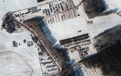 This satellite images shows a troop housing area and vehicle park in Rechitsa, Belarus.  Russia has moved troops from Siberia and the Far East to Belarus for sweeping joint drills. AP Photo