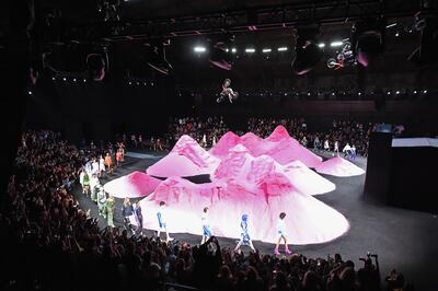 NEW YORK, NY - SEPTEMBER 10:  A motocross rider does a trick over the runway at the FENTY PUMA by Rihanna Spring/Summer 2018 Collection at Park Avenue Armory on September 10, 2017 in New York City.  (Photo by Dimitrios Kambouris/Getty Images for FENTY PUMA By Rihanna)