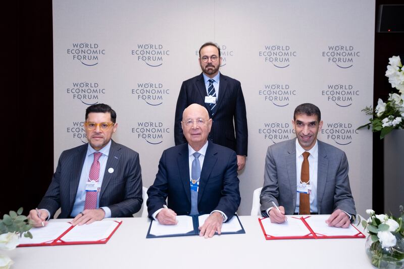 Mohammad Al Gergawi, Minister of Cabinet Affairs, Mohamed Al Shorafa, chairman of Abu Dhabi Department of Economic Development, Klaus Schwab, WEF’s founder and executive chairman, and Dr Thani Al Zeyoudi, Minister of State for Foreign Trade, during the signing of the agreement. Photo: UAE government