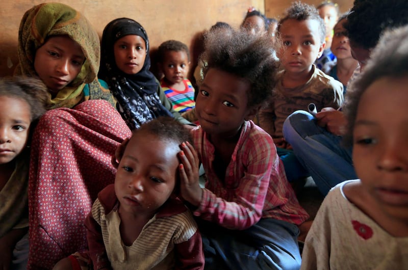 Children of Yemen's black minority known as 'Muhamasheen', literally the 'Marginalised', attend a lesson in the capital Sanaa. The minority group counts among the poorest of the poor in the Arab world's most impoverished country blighted by more than five years of conflict. AFP