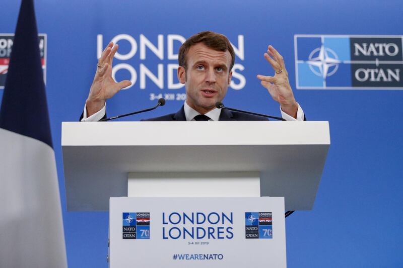 Emmanuel Macron, France's president, gestures while speaking during a news conference. Bloomberg
