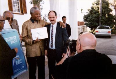 Nelson Mandela with Christo Brand on his 80th birthday. Courtesy Christo Brand