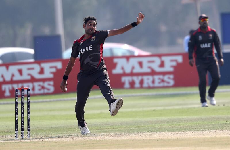 ABU DHABI , UNITED ARAB EMIRATES , October 22  – 2019 :- Zahoor Khan of UAE bowling during the World Cup T20 Qualifiers between UAE vs Jersey held at Tolerance Oval cricket ground in Abu Dhabi.  ( Pawan Singh / The National )  For Sports. Story by Paul