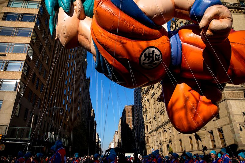 The Goku balloon make its way down Central Park West. AP Photo