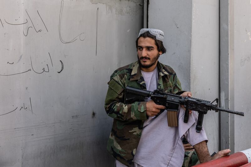 Taliban guards stand outside the Ministry of Information in Kabul. Stefanie Glinski / The National