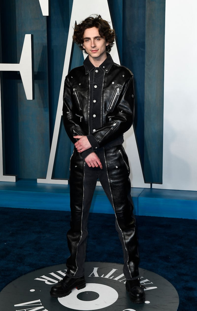 Timothee Chalamet, in a leather look by Alexander McQueen, attends the 2022 Vanity Fair Oscar Party on March 27, 2022. AFP