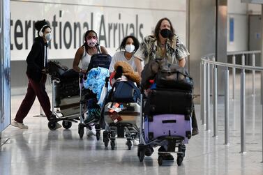 File photo: Travellers at Heathrow airport in London, Britain, 08 June 2021. EPA