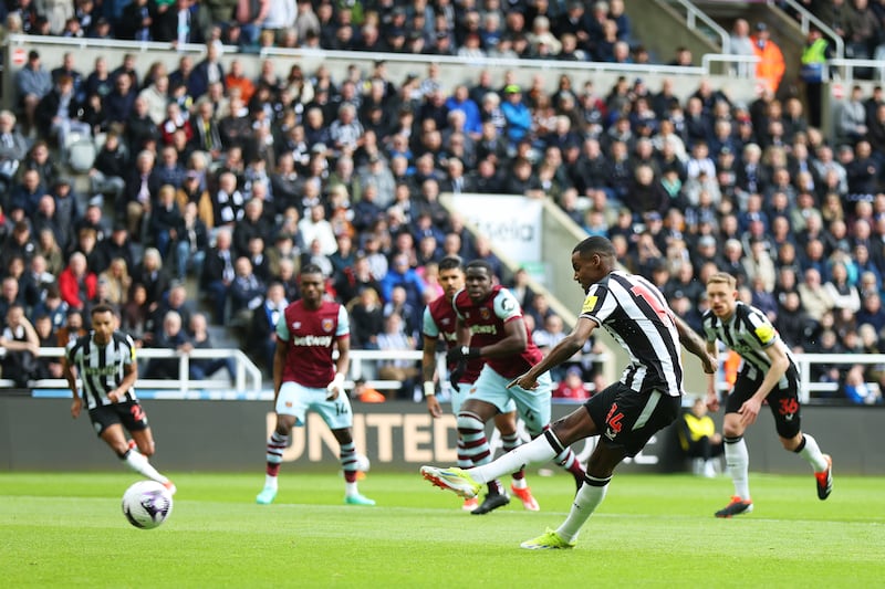 Alexander Isak of Newcastle United scores his team's first goal from the penalty spot. Getty Images