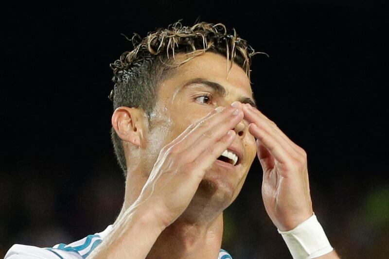 Real Madrid's Cristiano Ronaldo reacts after missing a chance to score during a Spanish La Liga soccer match between Barcelona and Real Madrid, dubbed 'El Clasico', at the Camp Nou stadium in Barcelona, Spain, Sunday, May 6, 2018. (AP Photo/Emilio Morenatti)