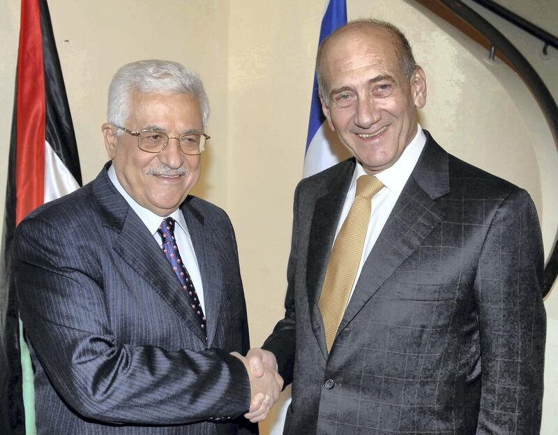 Israel's Prime Minister Ehud Olmert (R) greets Palestinian President Mahmoud Abbas during their meeting in Jerusalem September 16, 2008, in this picture released by the Israeli Government Press Office (GPO). A spokesman for Olmert told reporters that the two had held "serious" discussions in Jerusalem and would meet again after Abbas returns from a trip to the United States later this month. REUTERS/Moshe Milner/GPO/Handout (JERUSALEM).  FOR EDITORIAL USE ONLY. NOT FOR SALE FOR MARKETING OR ADVERTISING CAMPAIGNS. ISRAEL OUT. NO COMMERCIAL OR EDITORIAL SALES IN ISRAEL.