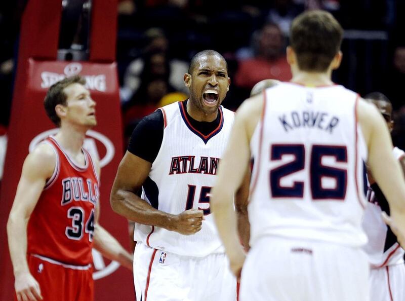 Al Horford, centre, has Atlanta and the rest of the NBA taking notice of the Hawks and their play-off intentions. David Goldman / AP Photo



