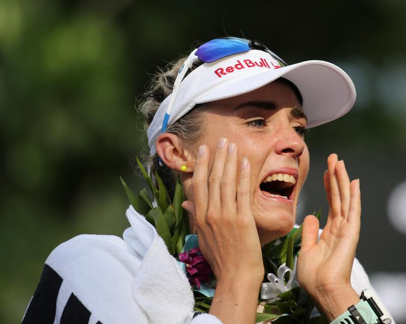 Lucy Charles, of England, reacts after finishing in second place at the Ironman World Championship Triathlon in Kailua-Kona, Hawaii. Marco Garcia / AP Photo