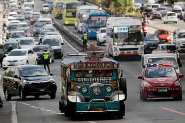 A jeepney, a popular and uniquely Filipino mode of mass transport, amid heavy traffic in Manila. A planned new city is hoped to ease congestion in the Philippines capital. Francis R Malasig/EPA