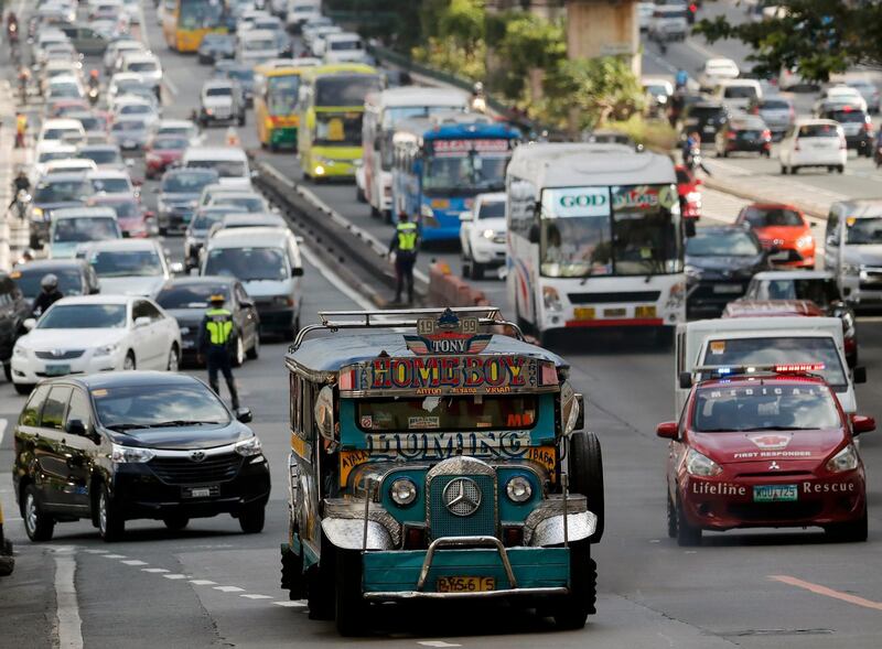 epa06622264 A jeepney, a popular and uniquely Filipino mode of mass transport, maneuvers amid heavy traffic in Makati city, south of Manila, Philippines, 23 March 2018, one day ahead of the day designated as Earth Hour. Earth Hour is an annual event in which lights are switched off in major cities around the world to draw attention to energy consumption and its environmental effects. The aim is to give people a voice on the planetâ€™s future and an opportunity to work together to create a sustainable low carbon future for planet earth.  EPA/FRANCIS R. MALASIG