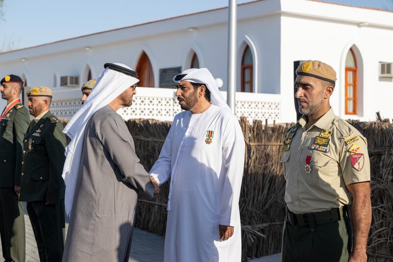 President Sheikh Mohamed with members of the UAE Armed Forces at the unification ceremony at Abu Mreikhah