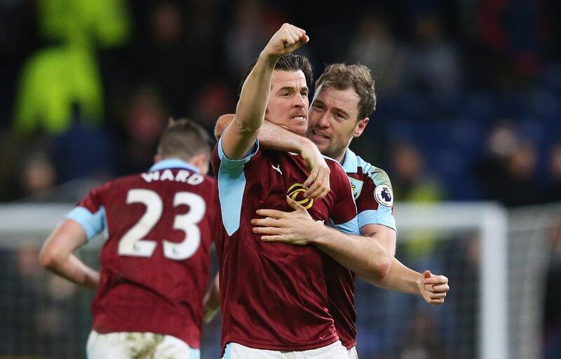 Joey Barton of Burnley, centre, celebrates scoring his side's only goal with teammate Ashley Barnes against Southampton at Turf Moor on January 14, 2017 in Burnley, England.  Alex Livesey / Getty Images
