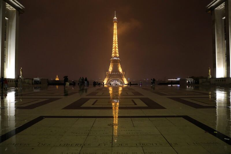 The Eiffel Tower is pictured in Paris before switching off lights on October 2, 2017 in tribute to the victims of the attacks in Las Vegas and Marseille.
At least 50 people were killed and hundreds wounded on October 1, when a gunman opened fire on a concert in Las Vegas in the deadliest mass shooting in modern US history. Earlier on October 1, a man knifed two young women to death outside the main train station in Marseille, France's second-biggest city. The Islamic State group claimed responsibility for both attacks via the jihadists' propaganda outlet Amaq, which said they were carried out by its "soldiers". It did not provide any evidence for either claim. / AFP PHOTO / LUDOVIC MARIN