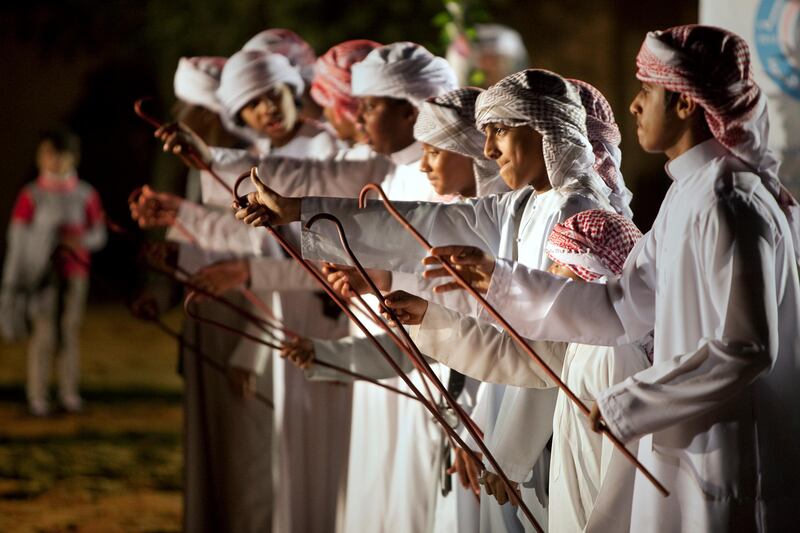 Al Ain, United Arab Emirates, January 30, 2013: 
Young boys dance and perform the traditional Emirati dance Al Yolla during a Family Day organized for the employees and the foster families of Dar Zayed for Family Care, a state-funded  programme in Al Ain for abandoned, orphaned or neglected children, on Wednesday evening, Jan. 30, 2013, at the Al Bedaa Resort near Al Ain where the organization is based. The children attending Family Day were a mixture of staff children, children who live in Dar Zayed villas and children placed long-term with outside foster families. It is the second time Dar Zayed has held the Family Day event.
Silvia Razgova / The National
