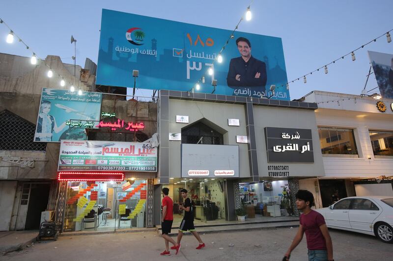 A picture taken on April 23, 2018, shows the campaign poster of Ahmed Radhi , a former Iraqi footballer, hanging in a street in Baghdad. / AFP PHOTO / AHMAD AL-RUBAYE
