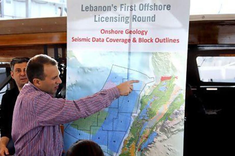 Gibran Bassil, Lebanon's energy minister, points at a map of possible offshore gas reserves. Mohammed Azakir / Reuters