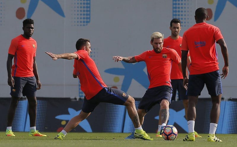 Lionel Messi, third left, in action during training. Manu Fernandez / AP Photo