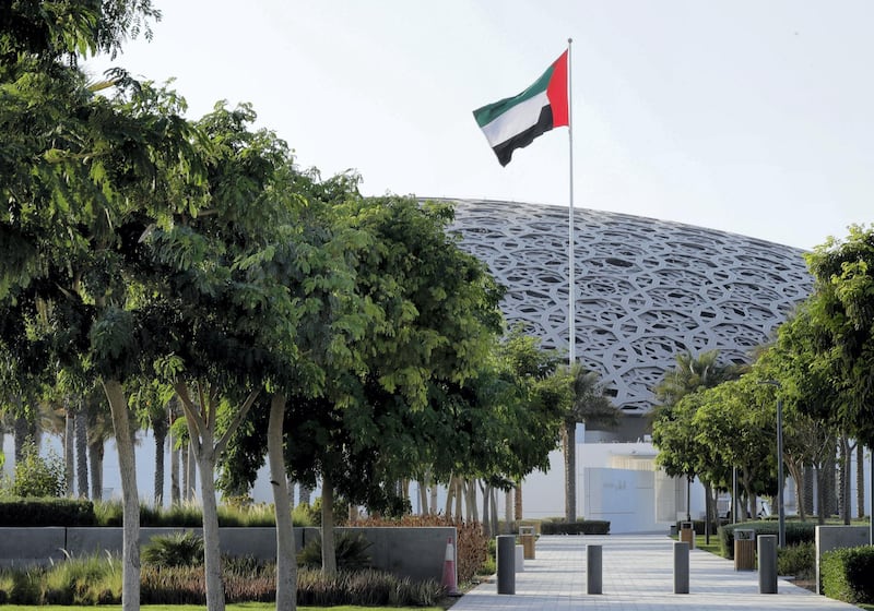 Abu Dhabi, United Arab Emirates, September 17, 2020.  The U.A.E. flag proudly waves at the Louvre Abu Dhabi on a Thursday afternoon.  Victor Besa/The National.
Section: Standalone

