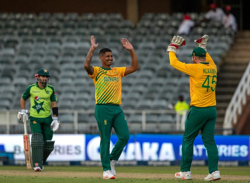 South Africa's bowler Beuran Hendricks, middle, celebrates with captain Heinrich Klaasen after dismissing Pakistan's batsman Mohammad Nawaz. AP