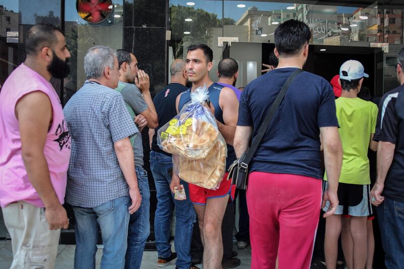 Scenes outside Beirut's bakeries. Hasan Shaaban/Bloomberg