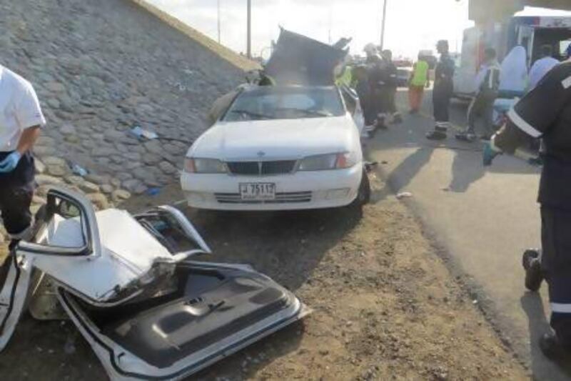 Three people died when a speeding 4x4 veered off Emirates Road near Al Waraqa interchange in Dubai and hit a saloon car which was stationary on the hard shoulder.