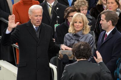 Vice President Joseph Biden receives the oath of office administered by The Honorable Sonia Sotomayor, Associate Justice of the Supreme Court of the United States, at the opening of the 57th Presidential Inaugural ceremony at the U.S. Capitol in Washington, D.C. on Monday, January 21, 2013. Biden's wife Jill stands at his side. Photo Ken Cedeno (Photo by Ken Cedeno/Corbis via Getty Images)