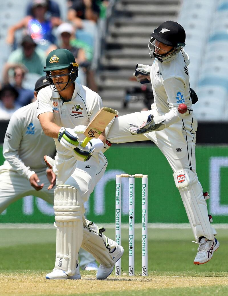 Australia's Tim Paine, left, made 79 in Melbourne on Friday. AP