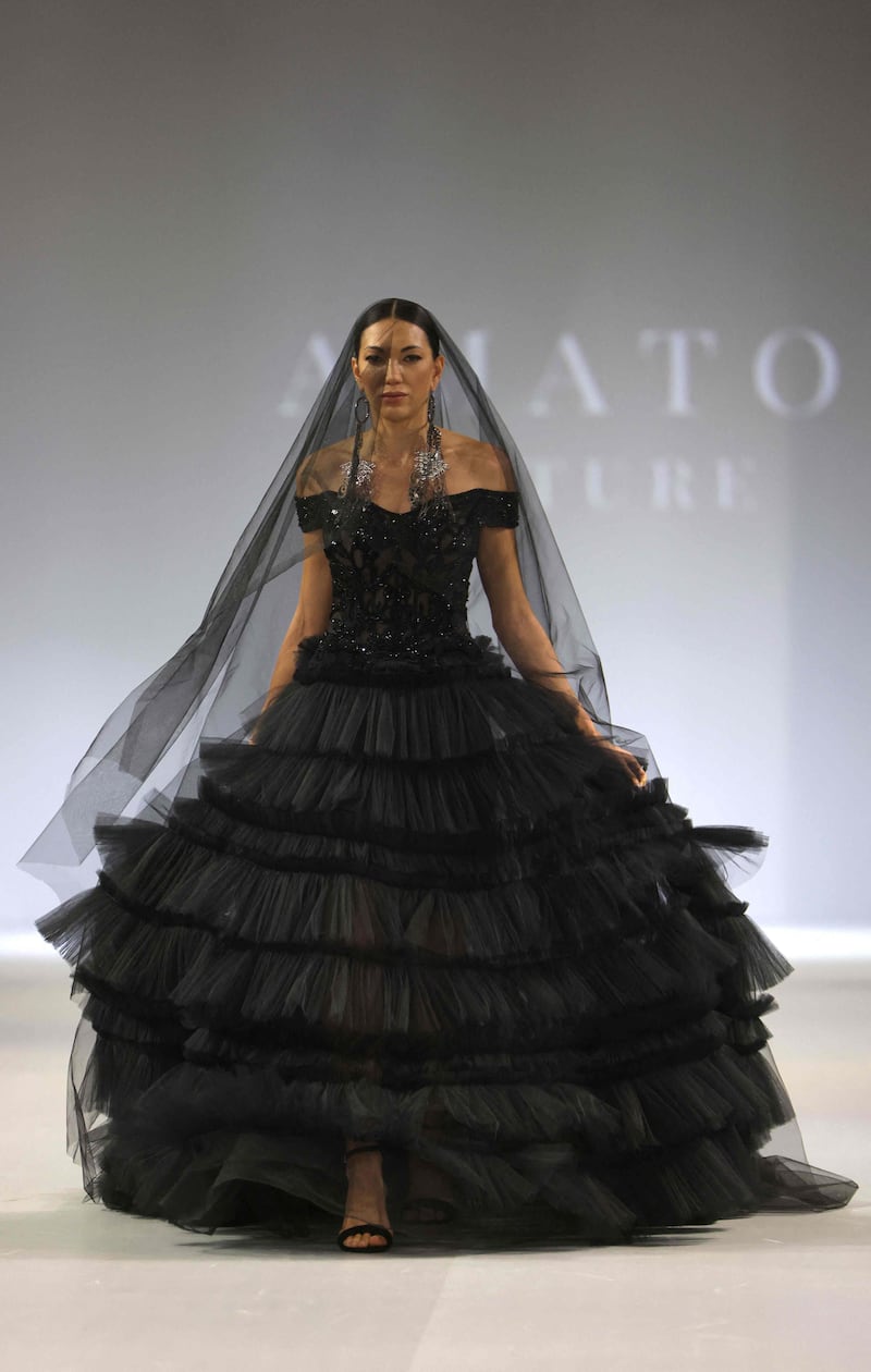 A gothic bride by Amato Couture during Arab Fashion Week 2022. AFP