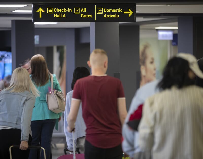 Passengers at Leeds Bradford Airport, the UK's worst for security queues. PA