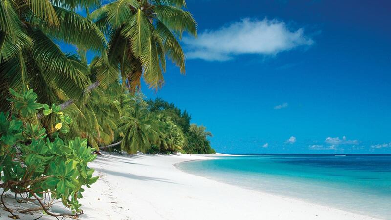 The beach at the new Four Seasons Desroches Island in the Seychelles. Four Seasons