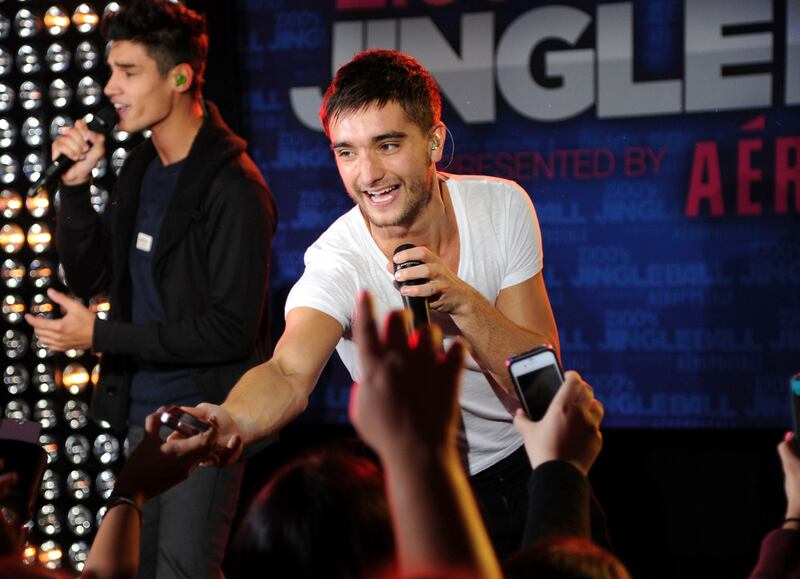 FILE - The Wanted's Tom Parker performs at Z100's Jingle Ball 2012 kickoff event in New York on Oct.  19, 2012.  Parker died Wednesday, March 30, 2022, after being diagnosed with an inoperable brain tumor.  He was 33.  (Photo by Evan Agostini / Invision / AP, File)