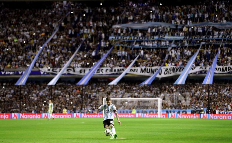 Argentina's Lionel Messi takes a freekick. Marcos Brindicci / Reuters