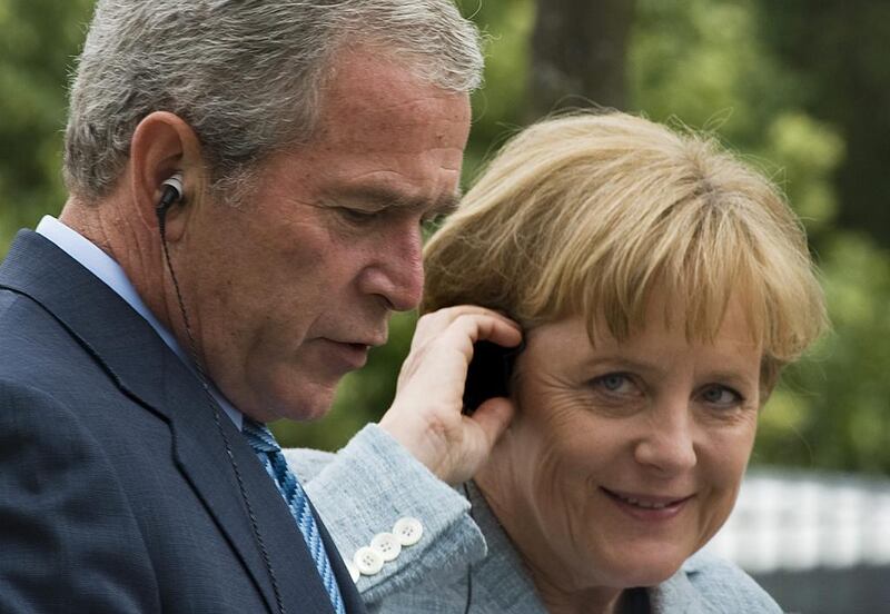 Former US president George W. Bush (left) and German chancellor Angela Merkel address a joint press conference at the guesthouse of the Federal Republic, the Meseberg Palace, in Meseberg north of Berlin on June 11, 2008. Jim Watson / AFP



