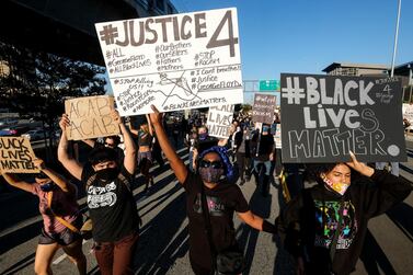 Demonstrators shut down the Hollywood Freeway in Los Angeles on Wednesday, May 27, 2020, during a protest against the death of George Floyd in police custody in Minneapolis earlier in the week. AP
