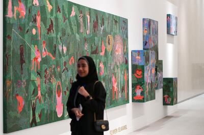 Slimen Elkamel's pieces span an 11-metre-long wall at Abu Dhabi Art. Khushnum Bhandari / The National