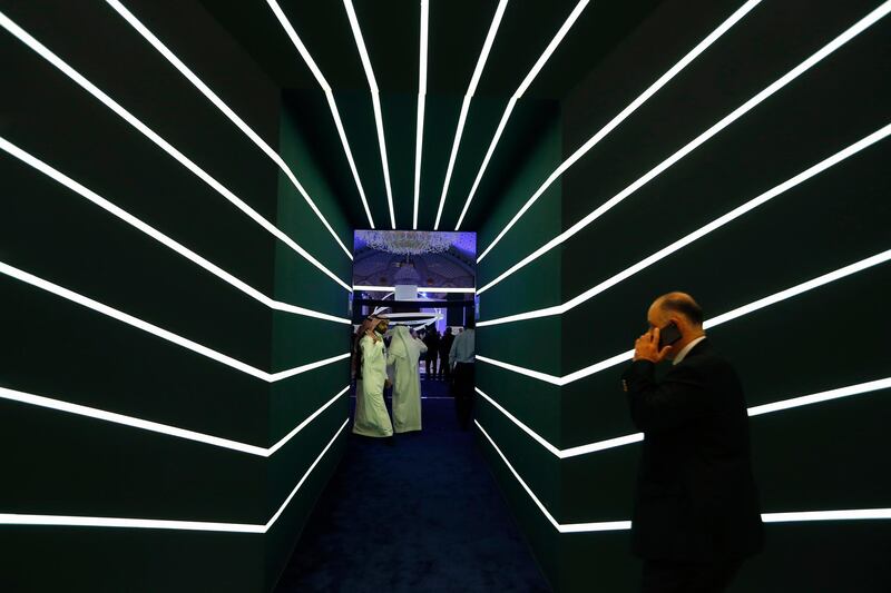 Participants enter meeting rooms at the Future Investment Initiative conference, in Riyadh, Saudi Arabia, Wednesday, Oct. 24, 2018. Saudi Crown Prince Mohammed bin Salman on Wednesday will address an international investment summit in Riyadh, his first such comments since the killing earlier this month of Washington Post columnist Jamal Khashoggi at the Saudi Consulate in Istanbul. (AP Photo/Amr Nabil)