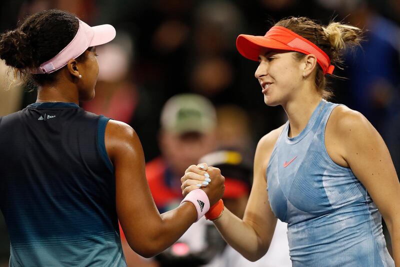 epa07432763 Belinda Bencic of Switzerland (R) shakes hands with Naomi Osaka (L) of Japan during the BNP Paribas Open tennis tournament at the Indian Wells Tennis Garden in Indian Wells, California, USA, 12 March 2019. The men's and women's final will be played, 17 March 2019.  EPA/JOHN G. MABANGLO
