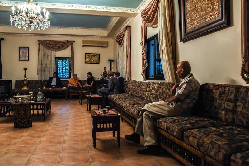 Bouday, Lebanon, 10 October 2020. Members of the Chamas clan linger in the meeting room of Sheikh abbas Chamas following a gathering called to discuss regional response to the killing of family member, Mohammad Chamas by a member of the Jaafar family 4 October 2020. Elizabeth Fitt for The National