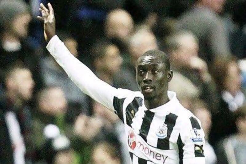 Newcastle United's Senegalese striker Papiss Cisse celebrates in the game against West Brom.