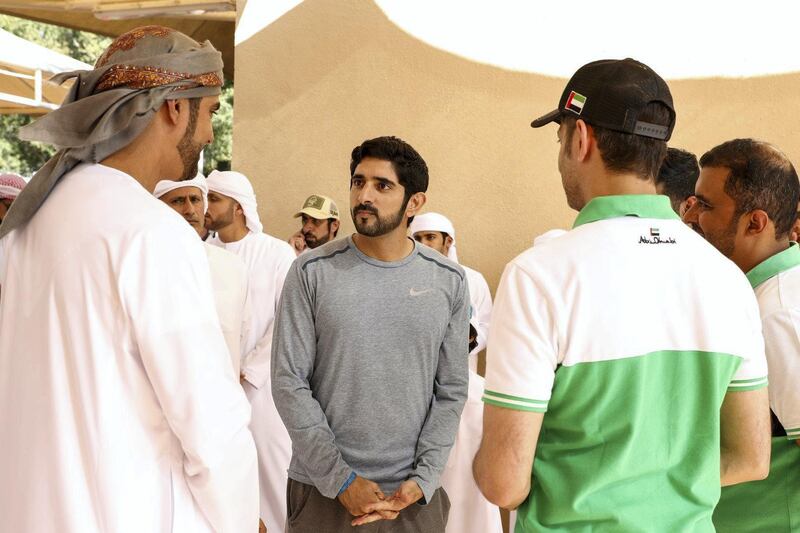 Sheikh Hamdan bin Mohammed speaks with participants of the 21st President of UAE Endurance Cup at the Emirates Endurance Village in Al Wathba, Abu Dhabi. Wam
