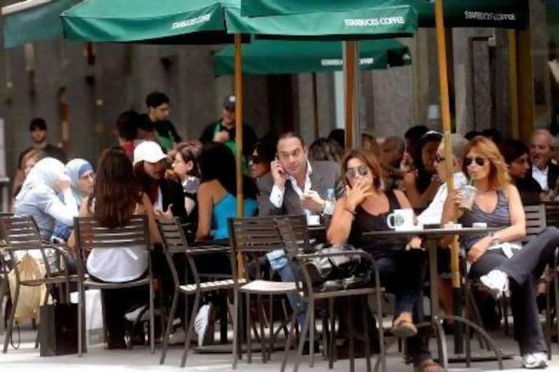Enjoying a morning coffee at a Starbucks cafe in Beirut, America looms large in the cultural consciousness of the Lebanese. AFP