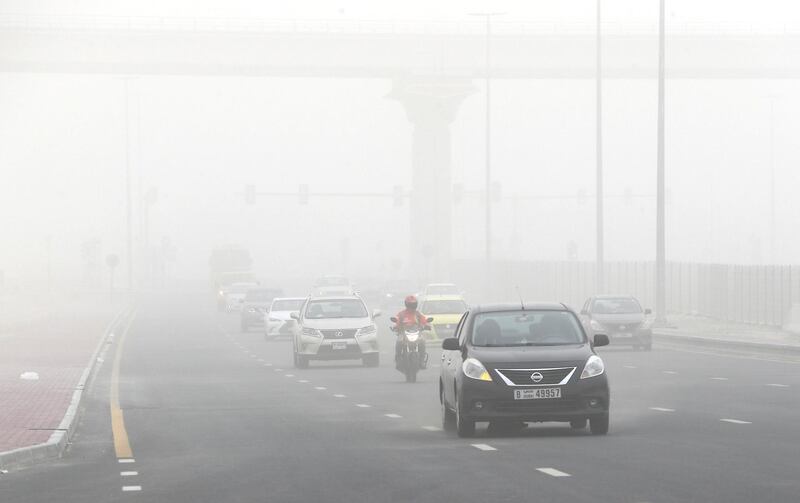 DUBAI, UNITED ARAB EMIRATES , July 21 – 2020 :- Traffic during the sandstorm in Discovery Gardens area in Dubai.  (Pawan Singh / The National) For News/Standalone/Online/Stock