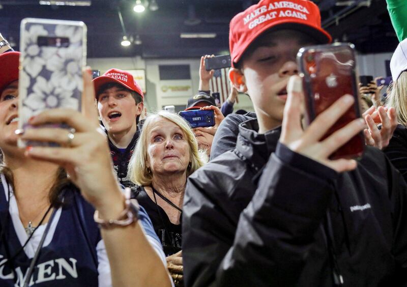 Supporters attend US President Donald Trump's campaign rally in Battle Creek, Michigan, December 18, 2019. Reuters