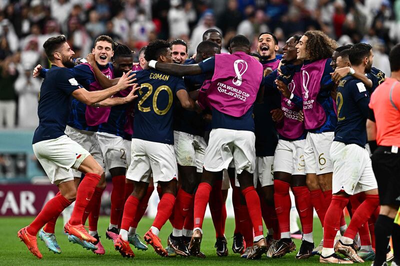 France players celebrate. They will play Morocco in the semi-finals. AFP