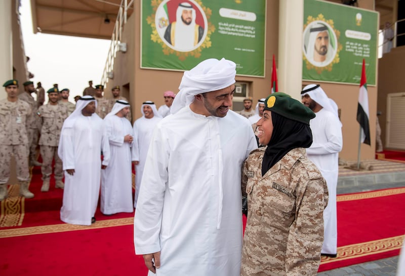 Sheikh Abdullah bin Zayed, Minister of Foreign Affairs and International Cooperation, stands for a photograph with his daughter Sheikha Fatima bint Abdullah bin Zayed Al Nahyan, during the summer course graduation ceremony at Sieh Al Hama military camp. Rashed Al Mansoori / Crown Prince Court - Abu Dhabi 